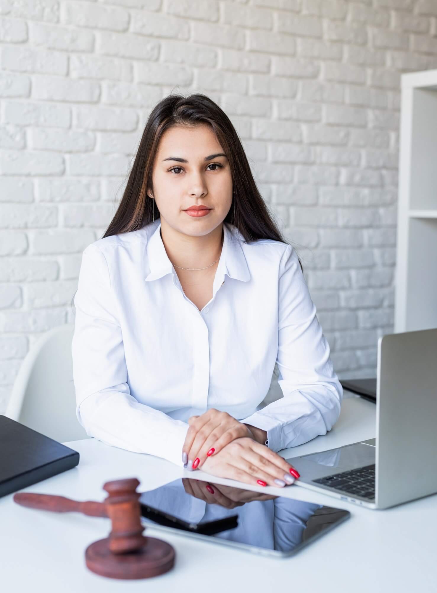 portrait-of-young-female-lawyer-at-her-workplace-1.jpg